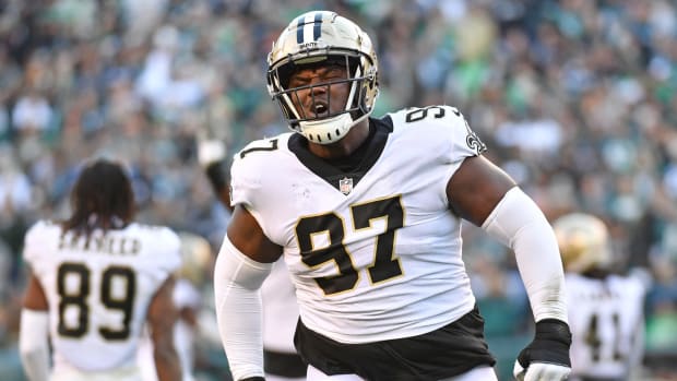 New Orleans Saints defensive end Malcolm Roach (97) celebrate a stop on fourth down during the fourth quarter against the Philadelphia Eagles at Lincoln Financial Field.